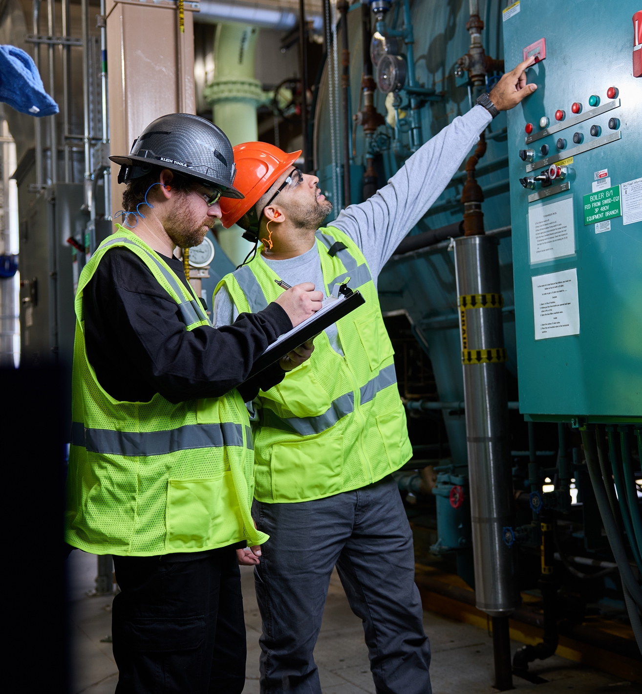 Boiler technicians working on-site